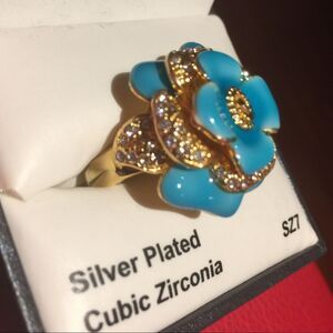 Silver plated cubic zirconia ring.